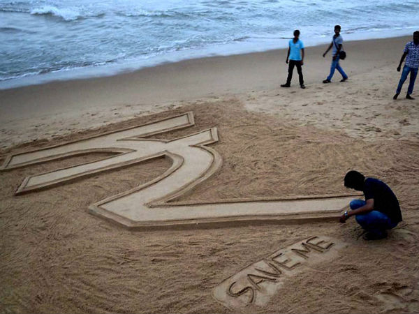 Dollar demand pushes rupee to record low