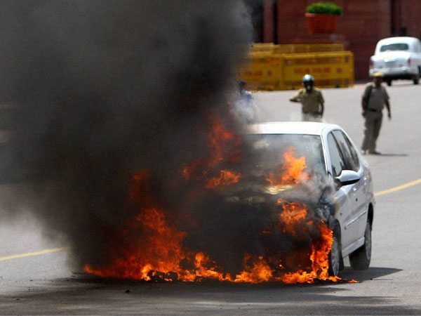 Car catches fire outside Parliament
