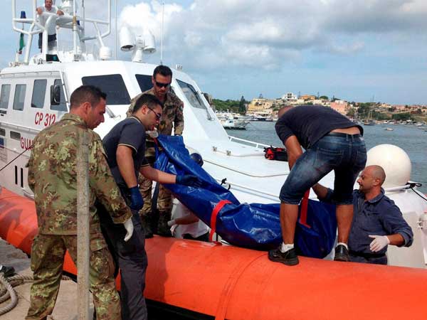 Italy shipwreck death toll rises