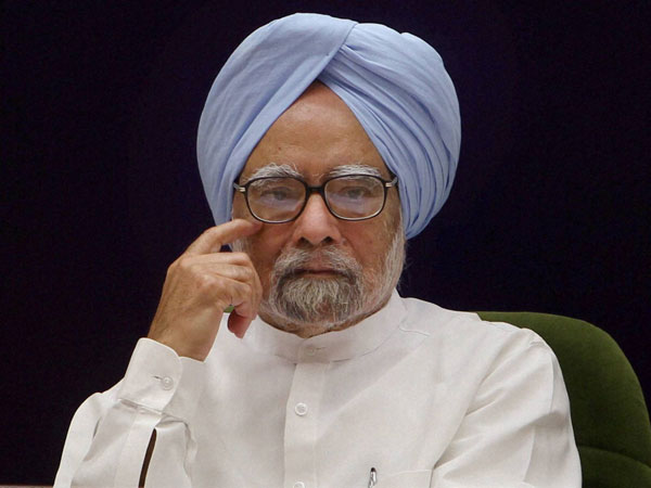 CHOGM: Manmohan explains to Rajapaksa CHOGM: Manmohan explains to Rajapaksa