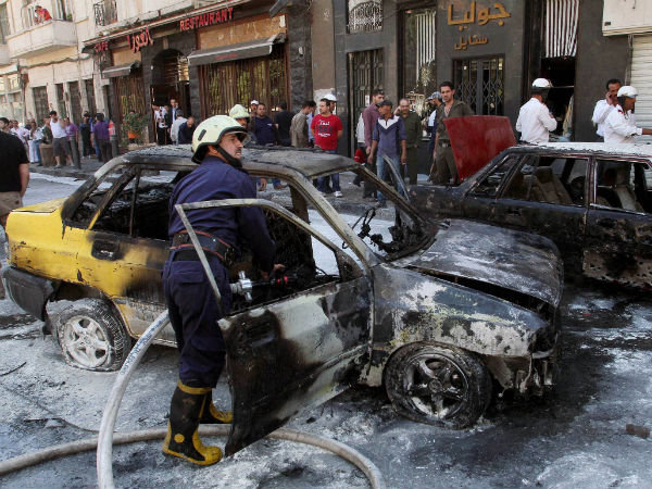 syria-cars-damaged-rocket-attack