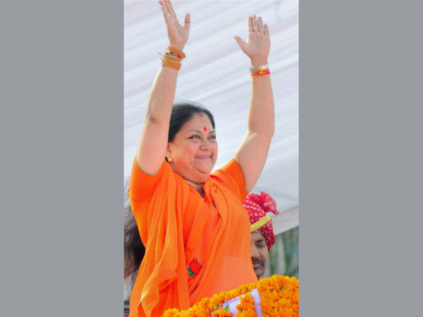 Raje distributes portfolios; retains 46 ministries