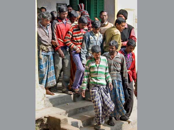 Bolpur: Balai Mardi 12 other accused being produced at a court in Bolpur on Thursday in connection with the gangrape of a tribal girl in Subalpur village. Bolpur: Balai Mardi 12 other accused being produced at a court in Bolpur on Thursday in connection with the gangrape of a tribal girl in Subalpur village.