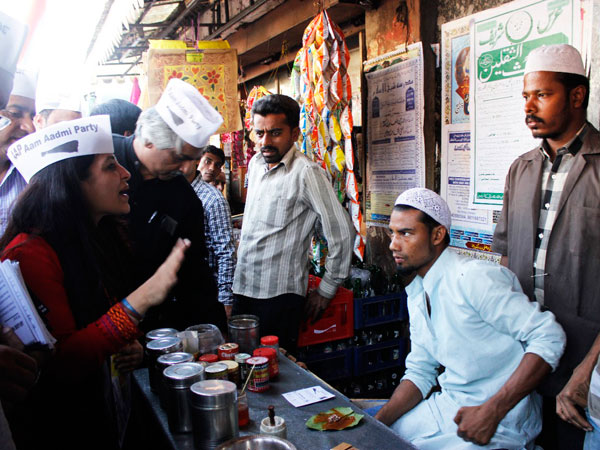 Shazia Ilmi interacting with shopkeepers