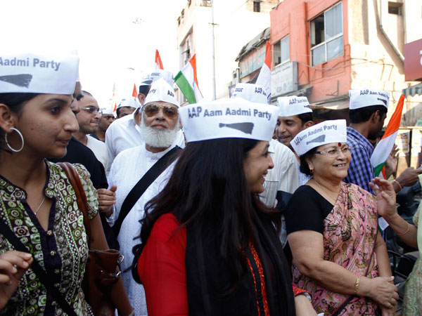 Shazia Ilmi with party workers and volunteers