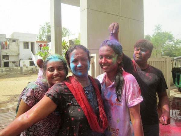 Woman celebrating Holi Woman celebrating Holi