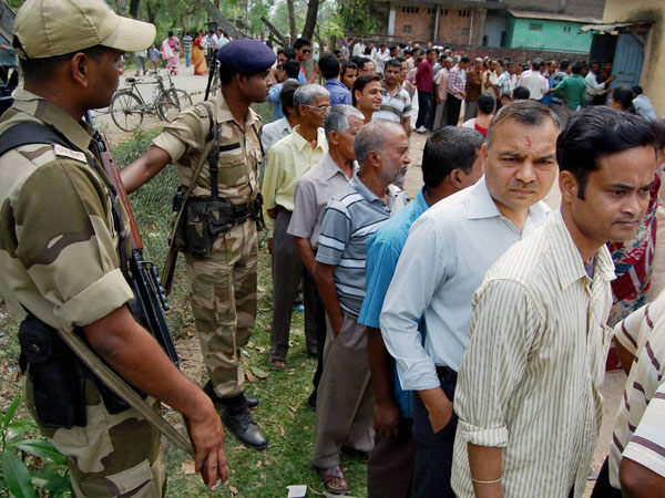 Soldier keeps vigil outside a polling station