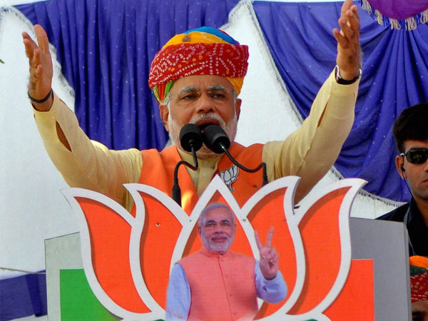 Narendra Modi addresses an election rally at Jayal