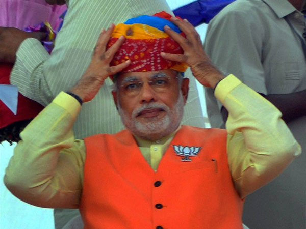 Narendra Modi wears a turban at an election rally