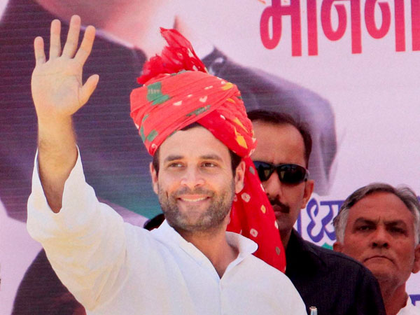 Rahul Gandhi waves during an election rally at Jhunjhunu