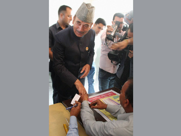 Ghulam Nabi Azad before casting his vote