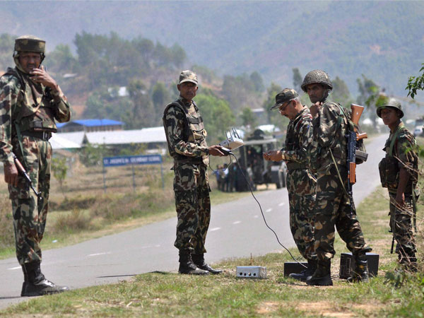 Assam Rifles personnel operate a mobile jammer
