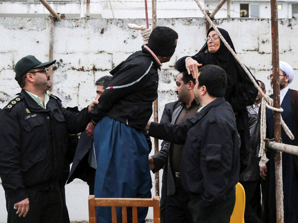 Samereh Alinejad, right, slapping blindfolded Bilal