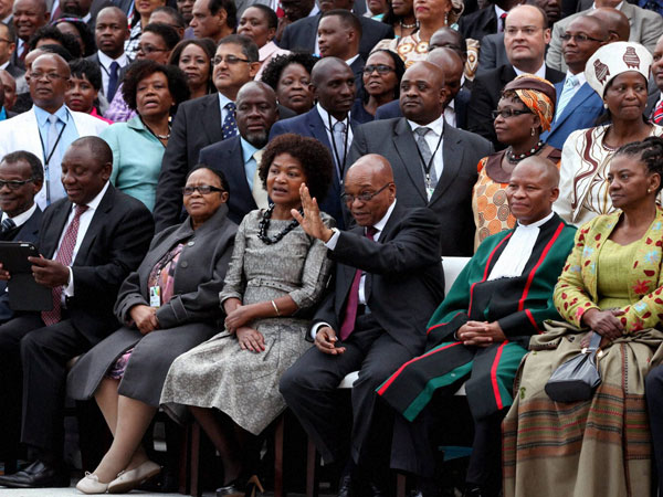 Members of Parliament sit with South African President Jacob Zuma