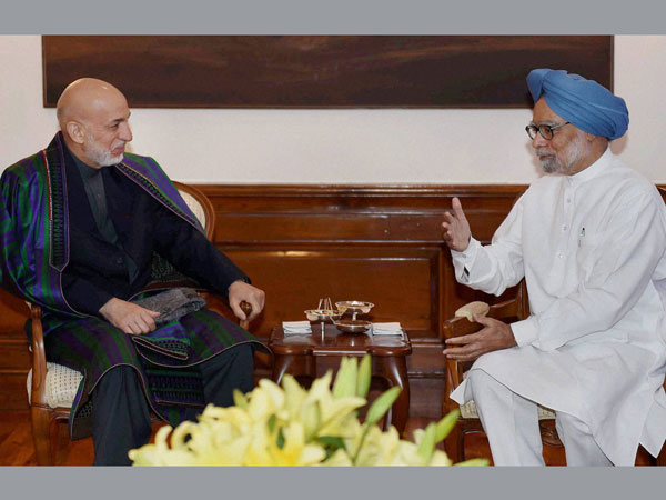 Koirala, Karzai meet Manmohan Singh 