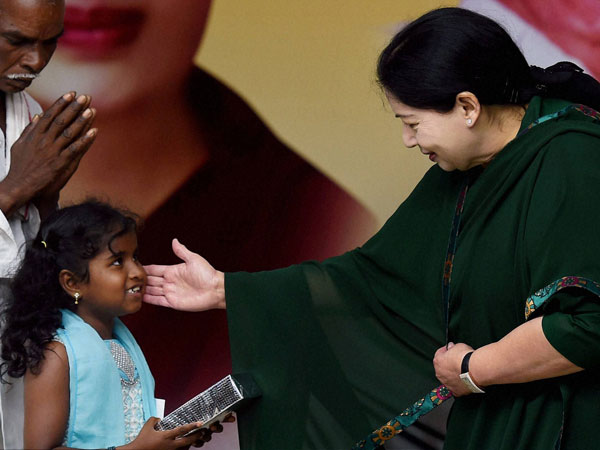 AIADMK Supremo and Tamil Nadu Chief Minister J Jayalalithaa interacts with a child