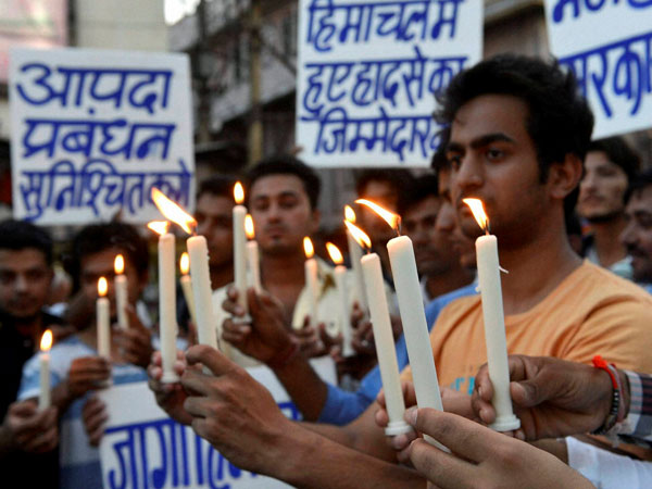 Students take part in candle light protest