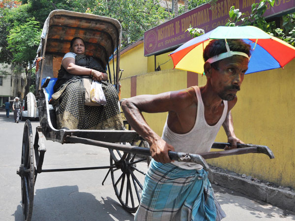Human rickshaw india image