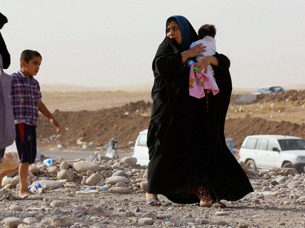 Iraqi refugees arrive at Khazir refugee camp