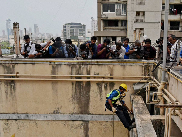 Mahanagar gas officials disconnect the gas connection to the Campa Cola Society