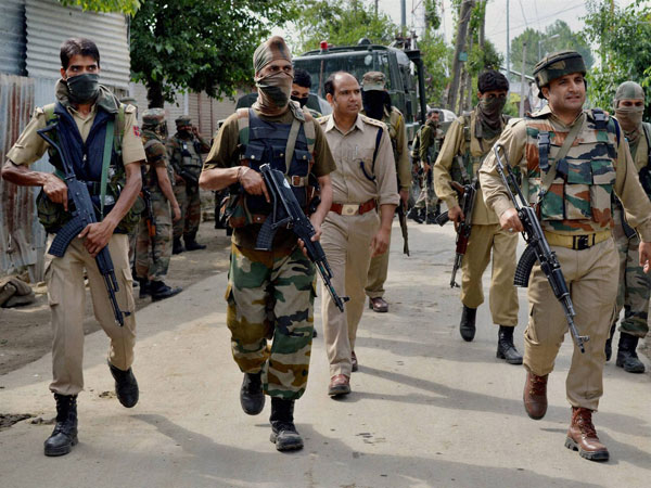 Security jawans patroling a street during strike call