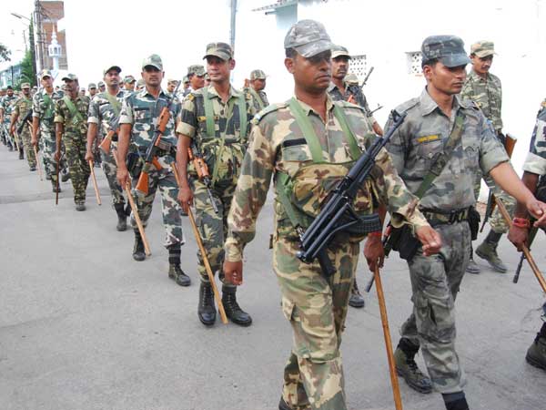 Security personnel conduct flag march on the streets