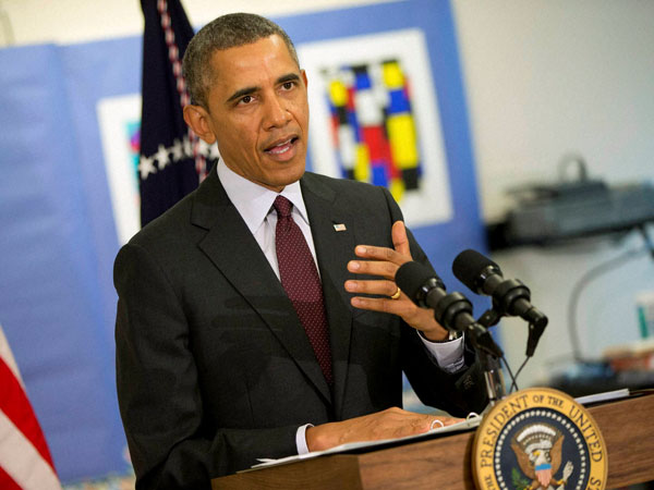 Obama, Merkel vow to improve intelligence cooperation