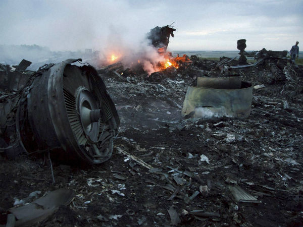 Debris at the crash site of a passenger plane near the village of Hrabove, Ukraine on Thursday.(PTI photo)