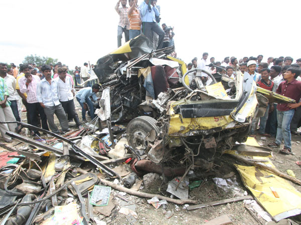 A passenger train rammed into a school bus at an unmanned railway crossing in Medak