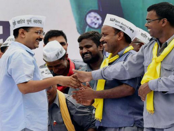 Kejriwal with auto drivers at mega rally.