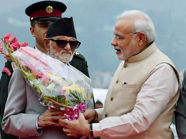 PM Narendra Modi meets his Nepalese counterpart Sushil Koirala