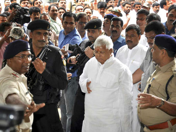 Lalu Prasad Yadav with the security cover. (PTI Photo)