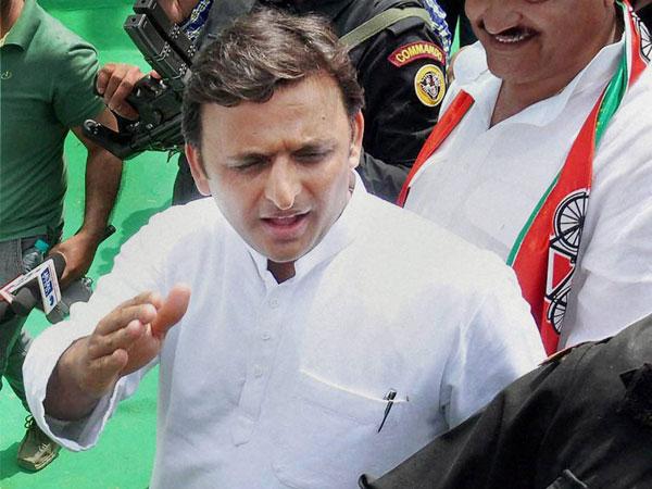 Mayawati questions Akhilesh's foreign trip