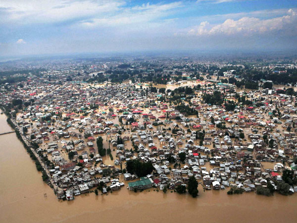 An aerial view shows buildings partially submerged