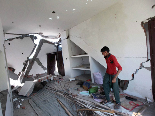 A damaged house at the flood hit banks