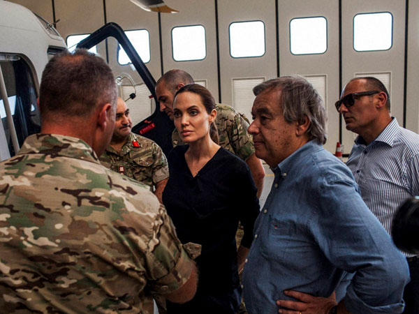 Valetta : In this image made available from the UNHCR on Monday Sept. 15, 2014 American actress, Angelina Jolie, centre, who serves as Special Envoy for the United Nations High Commission for Refugees, listens to officers in the Maltese military discuss rescue at sea operations for refugees at a military base in Valetta, Malta on Sunday, Sept. 14, 2014. Since the start of 2014, more than 2,500 asylum seekers have perished trying to cross the Mediterranean.