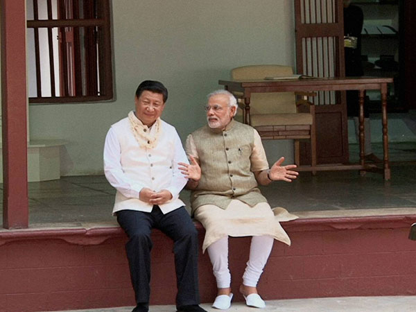 Beginning of a new friendship: Chinese prez meets Narendra Modi (Pics)