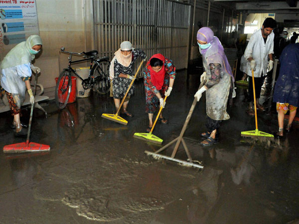 Hospital staff clean the Shri Maharaja Hari Singh Hospital