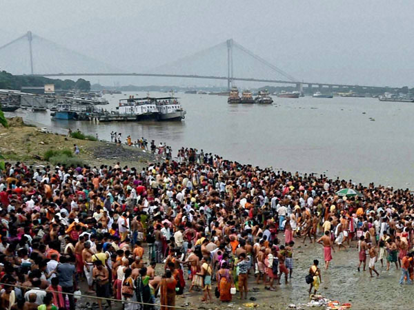 Devotees gather at the bank of River Ganga