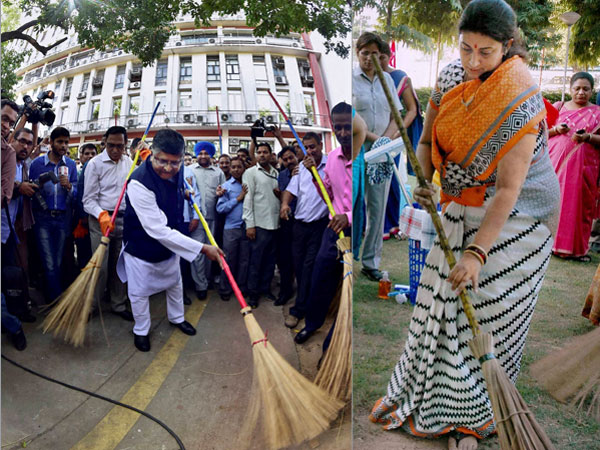 Ravi Shankar Prasad, Irani wield broom 