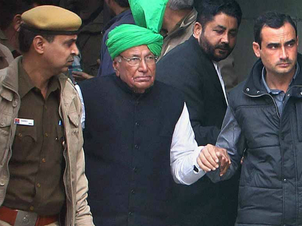 On January 22, 2014 the trial court convicted and sentenced Chautala and nine others to ten years jail-term for illegally recruiting 3,206 junior teachers. 