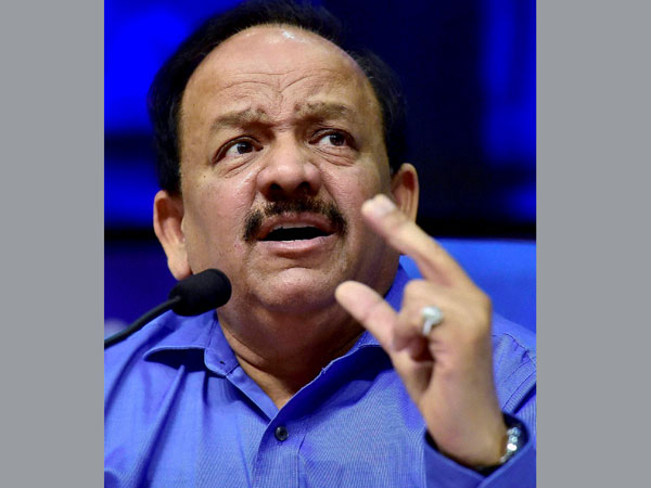 Union Health Minister Harsh Vardhan gestures