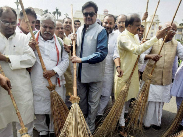 BJP MP Shatrughan Sinha wields a broom with party MLAs
