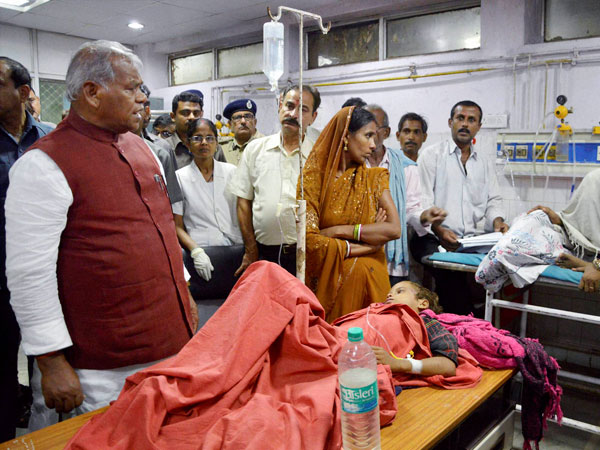 Bihar CM Jitan Ram Manjhi meets an injured