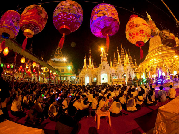 Buddhist devotees pray at Myanmar's landmark Shwedagon Pagoda