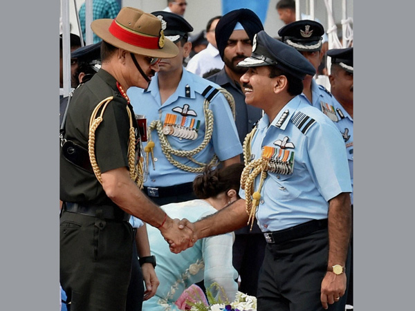 Air Chief Marshal Arup Raha shakes hands with Army chief Gen Dalbir Singh Suhag