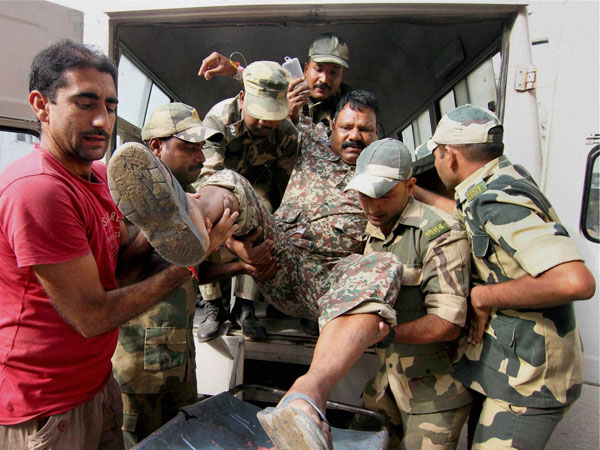 An injured BSF jawan being taken to the Government Medical College Hospital