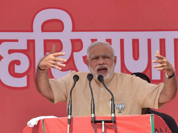 Modi addressing a rally in Haryana