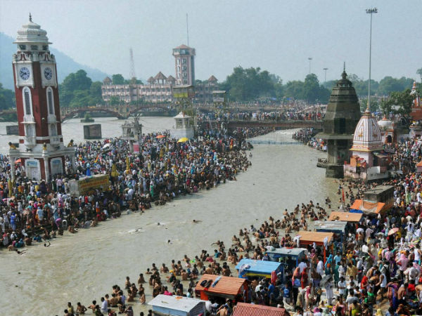 Devotees taking bath in Ganga in Haridwar.