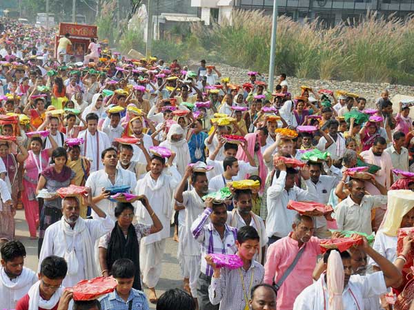 Gaudiya Math devotees carrying sweets, curd, milk